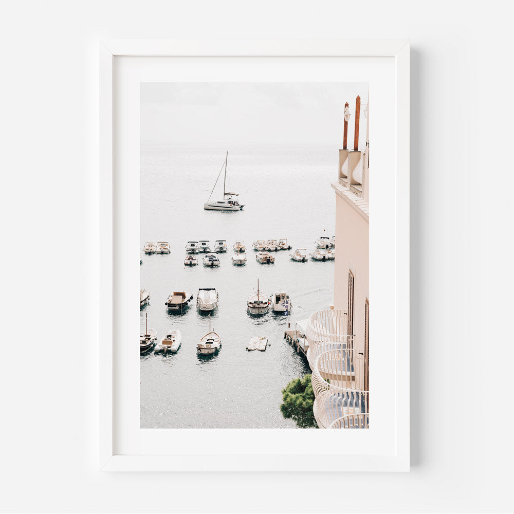 Scenic View from Amalfi Hotel: Boats parked in the sea against the stunning backdrop of the Amalfi Coast, Italy, perfect for coastal-themed wall art and home decor.