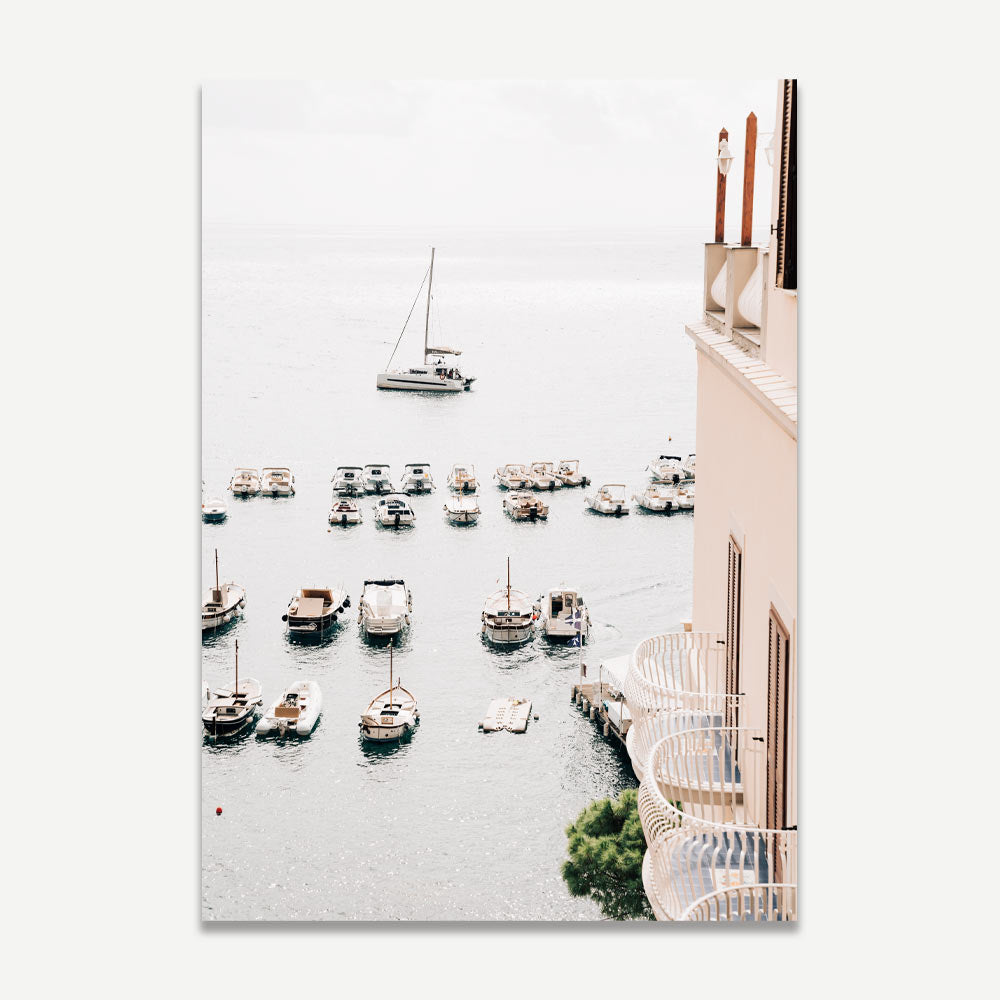 Amalfi Coast Charm: A breathtaking scene from Amalfi hotel, featuring boats on the tranquil sea against the iconic backdrop of the Amalfi Coast, enhancing wall decor with coastal elegance and modern artistry.