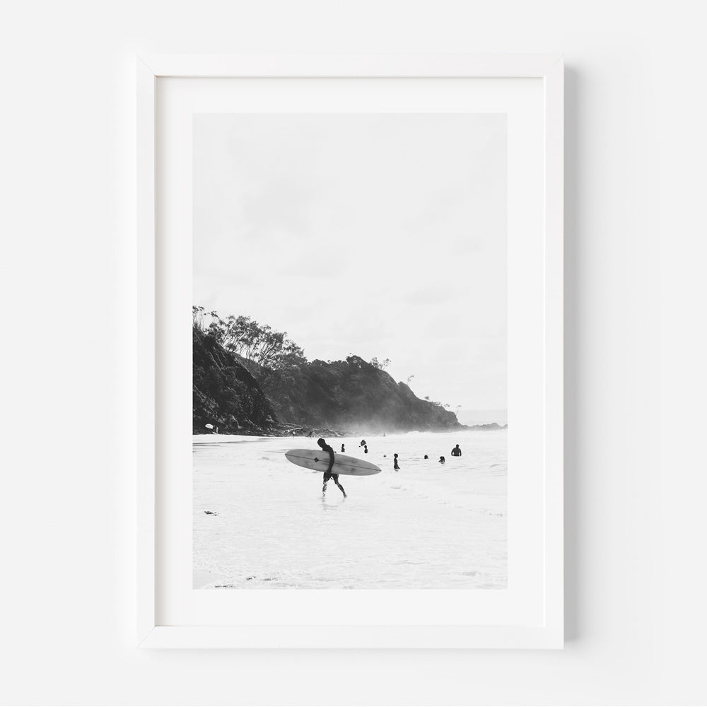 Coastal Elegance: Black and white framed Wategos Beach, Byron Bay image with mountains and sea, perfect for minimalist wall decor.
