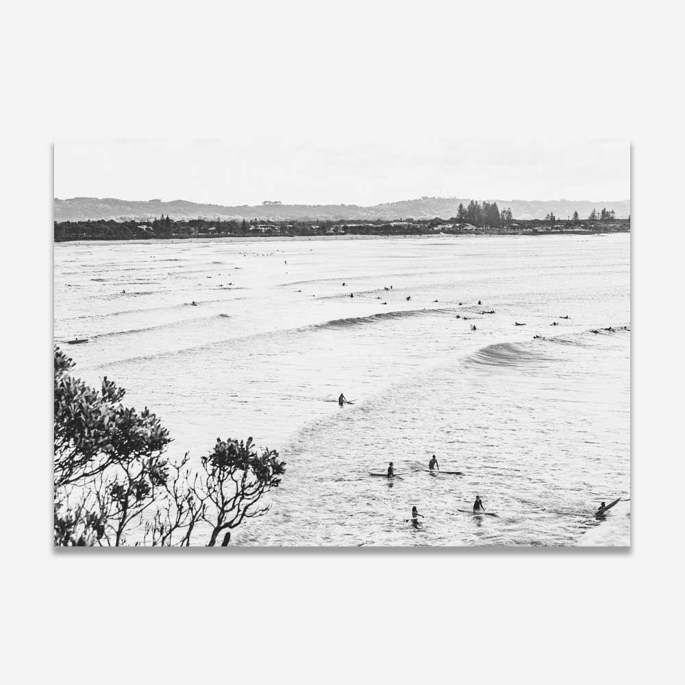 Capture the essence of surf culture with this black and white photo of surfers at The Pass, Byron Bay - ideal for modern wall art.
