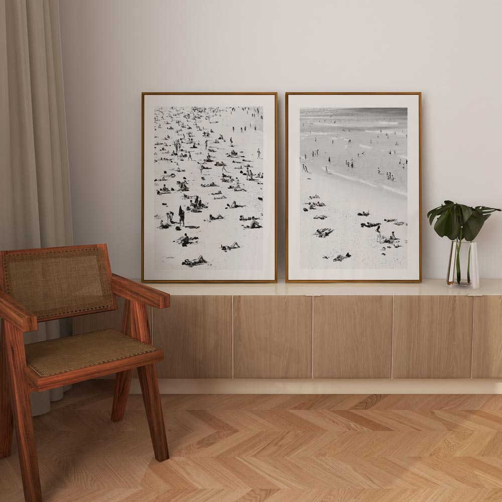Breathtaking black and white photograph of beachgoers at Bondi Beach, Australia - perfect wall art decor.