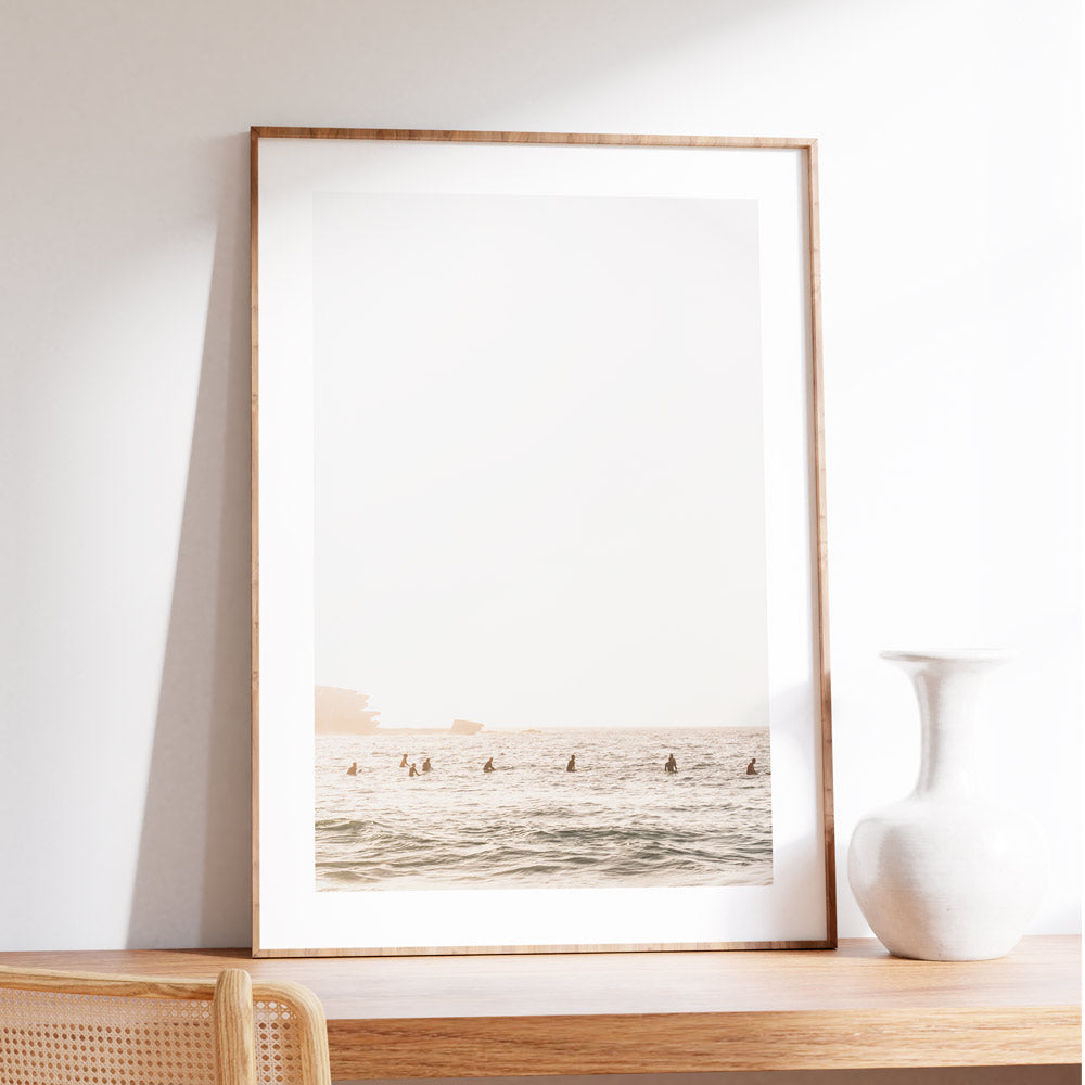 White framed photo of surfers at Bondi Beach, prints shop