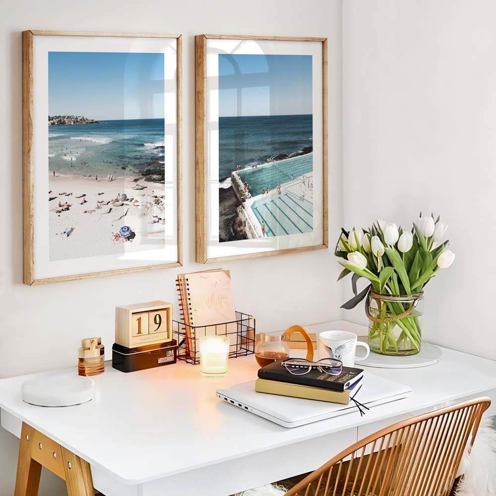 Wall art featuring a golden framed photo of people swimming on Bondi Beach - a stunning addition to your wall decor collection.