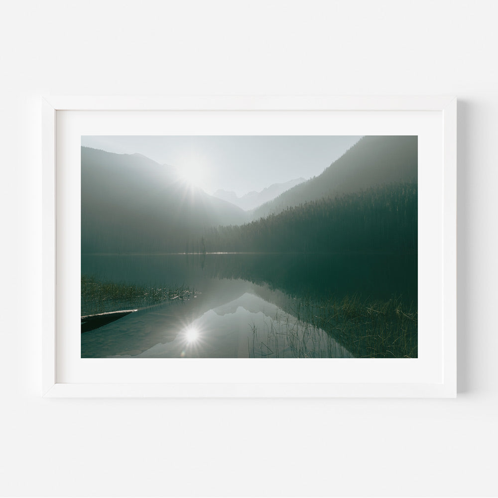 A framed print depicting a landscape with a lake and mountains in the background, titled 'Lower Lake'.
