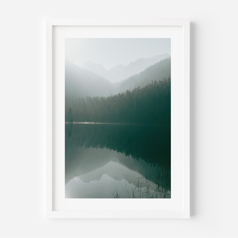 A framed photo of JOFFRE, a mountain lake in British Columbia, with trees in the background - wall art decor.