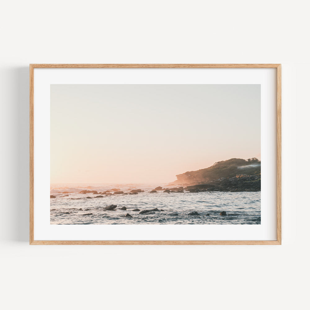 White framed photo of ocean and rocks at sunrise, Magic Point Maroubra Beach - wall art prints shop