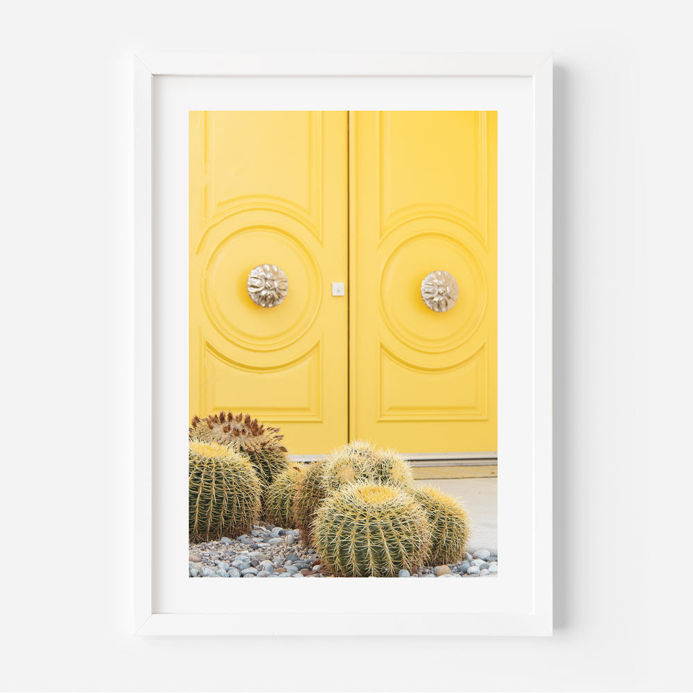 Framed art of a yellow door and cactus in Palm Springs - art prints for home decor by Oblongshop.