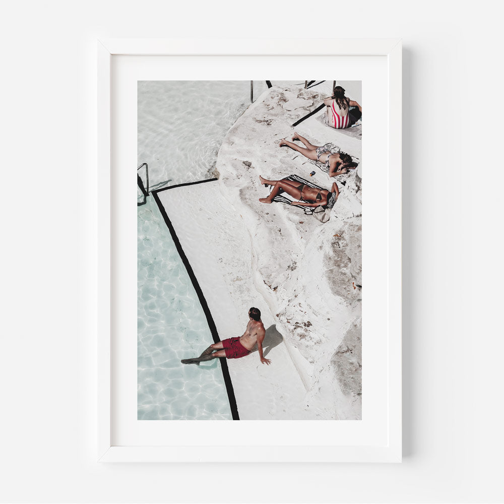 Poolside Relaxation: Canvas print of people unwinding at Bondi Icebergs poolside, perfect for coastal wall art and photography decor.