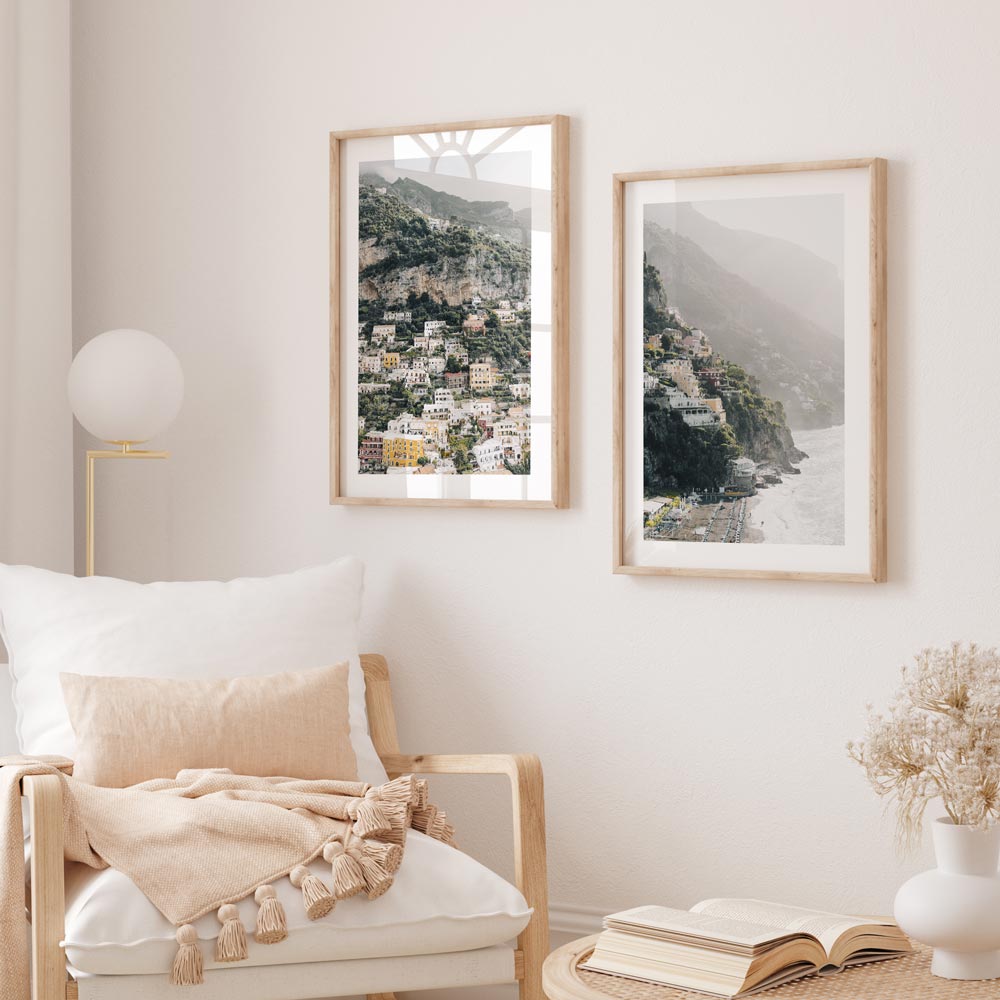 Capture the beauty of the Amalfi Coast in Italy with this image of Positano, showcasing colorful buildings along the coastline.