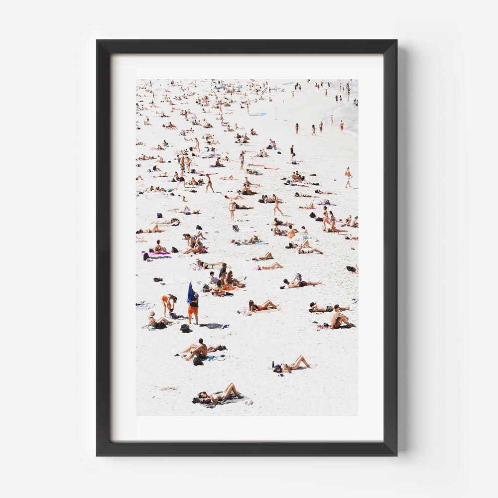 Elevate your walls with this exquisite black framed print showcasing people on the beach - a masterpiece from Oblongshop.