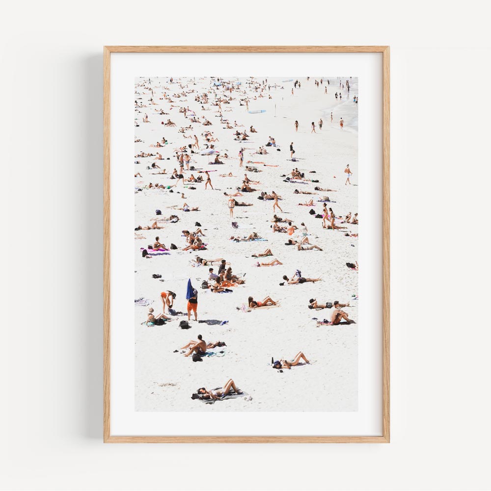 Discover the beauty of Bathers on Bondi Beach with this elegant golden framed print - a statement piece for any wall.