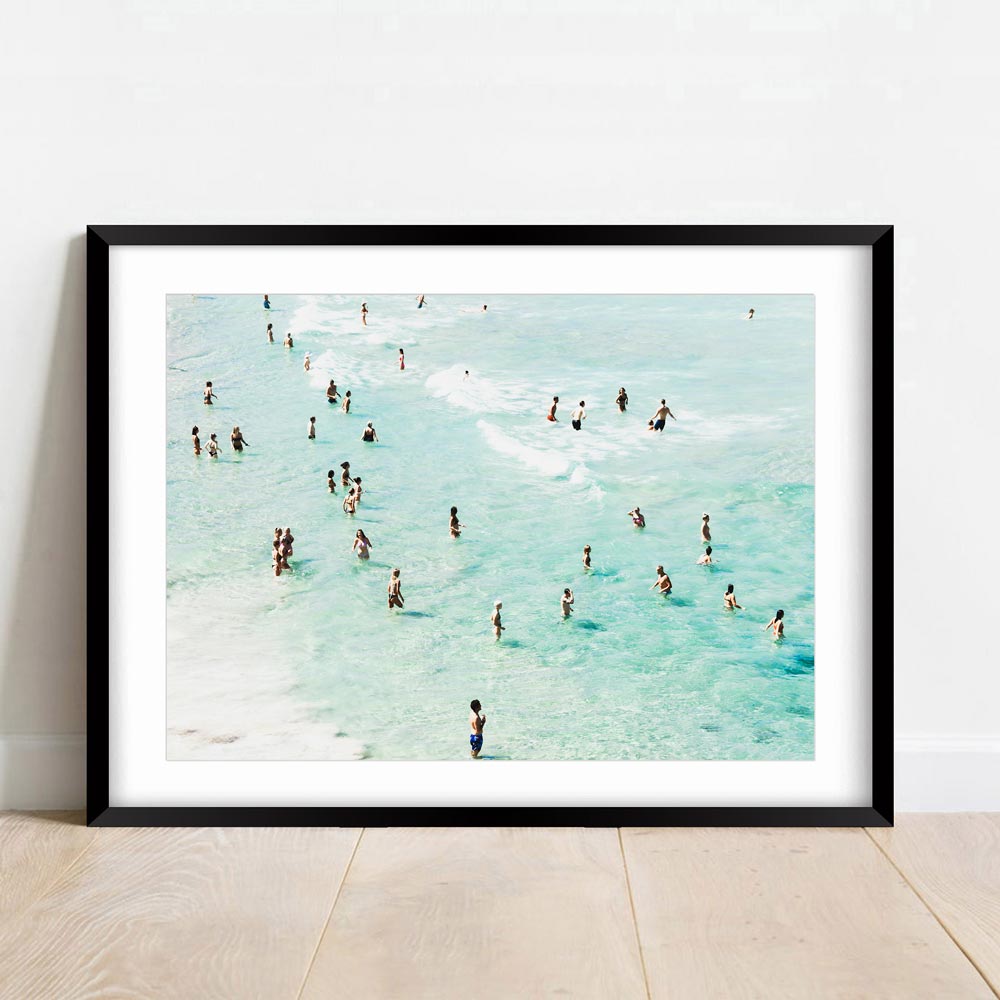 Wall artwork: A black framed print capturing people swimming in the ocean - Bathers on Bondi Beach