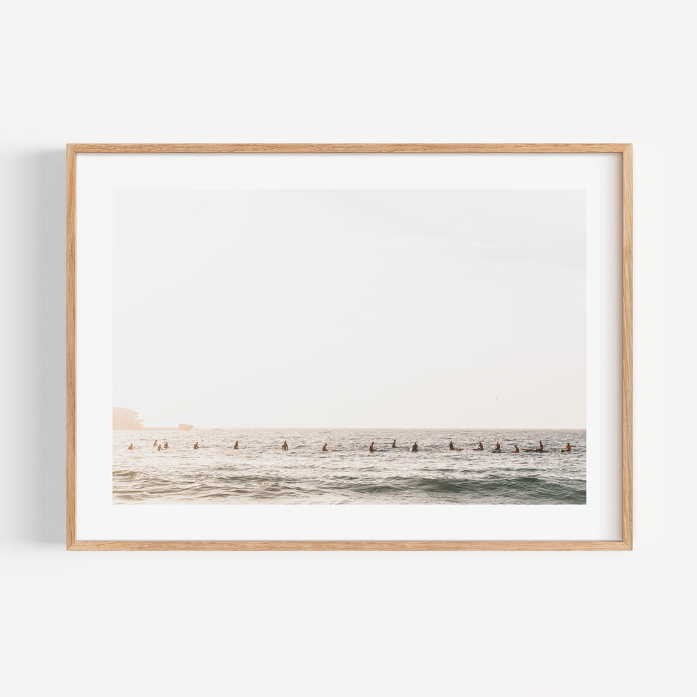 Artwork of surfers on the beach, a cool addition to your wall decor collection.