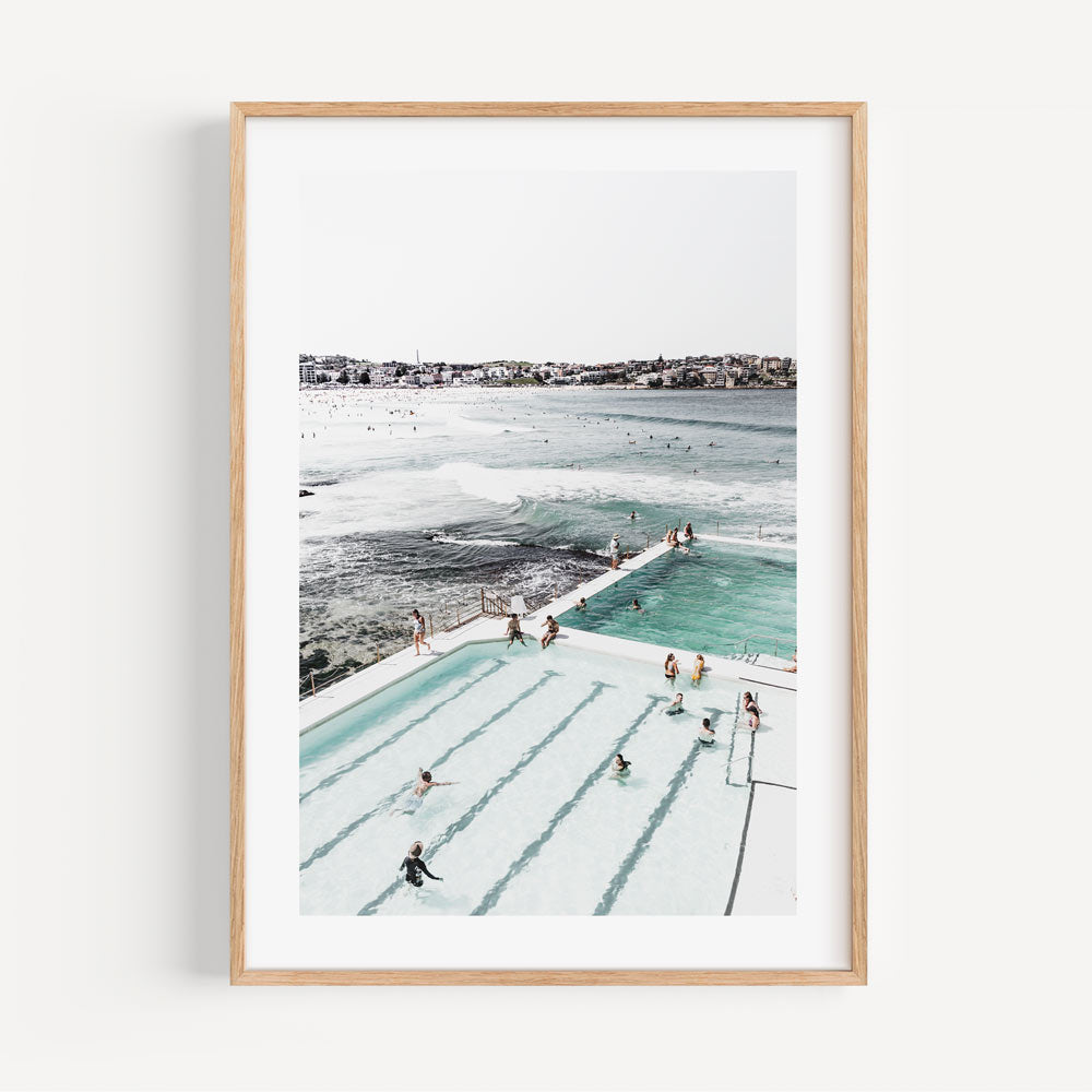 Seaside Bliss: Bathers at Bondi Icebergs pool with ocean backdrop, perfect for coastal-themed wall art.