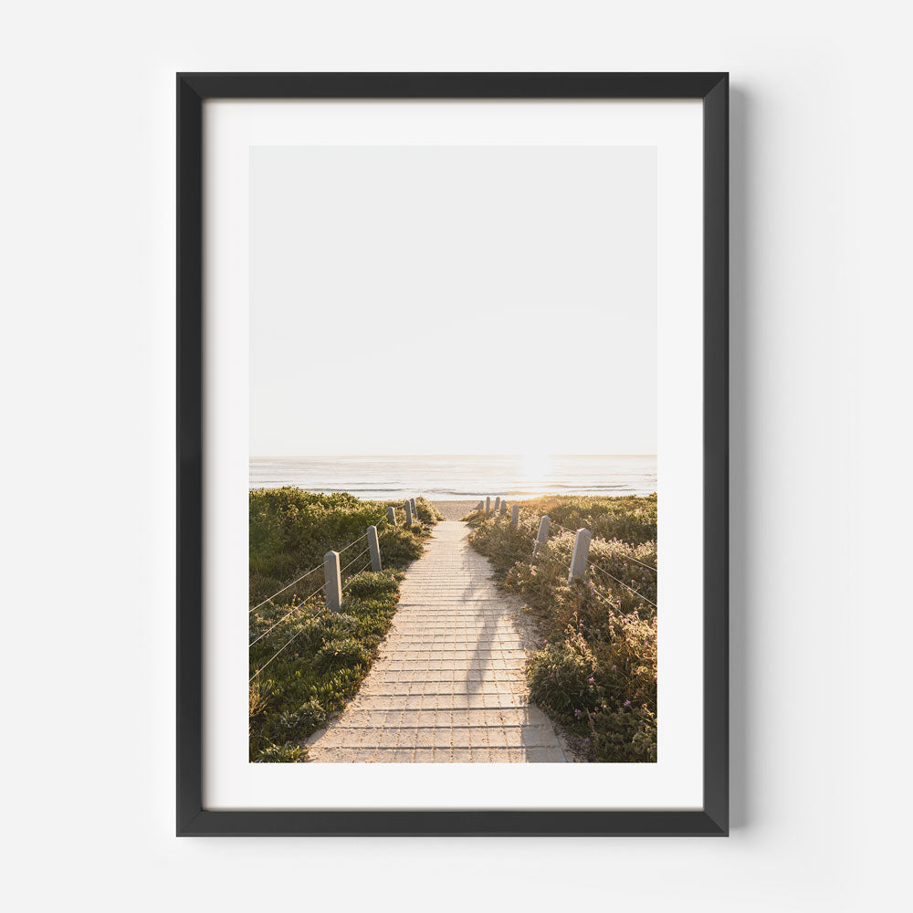 Transform your living room or office with this captivating white framed photo of a pathway to Maroubra Beach - a unique piece of wall art.