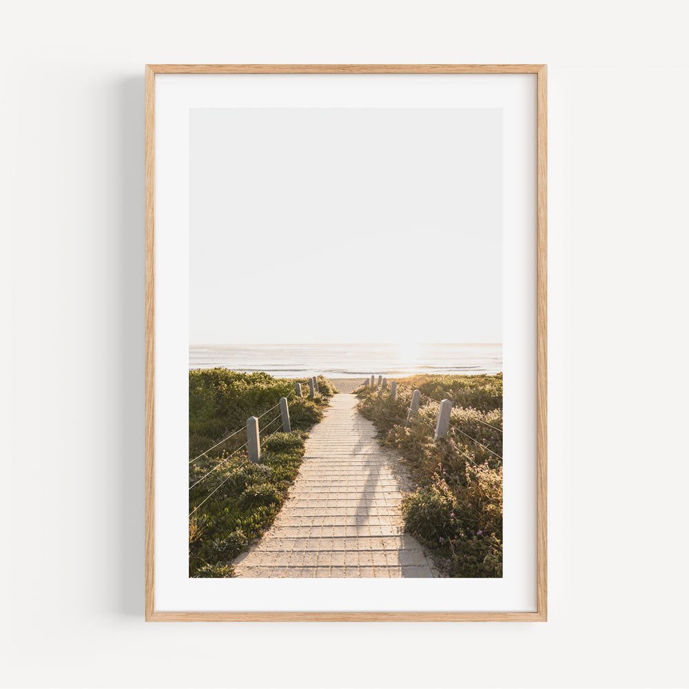 Enhance your wall decor with this exquisite white framed photo showcasing a pathway to Maroubra Beach - a must-have for art enthusiasts.