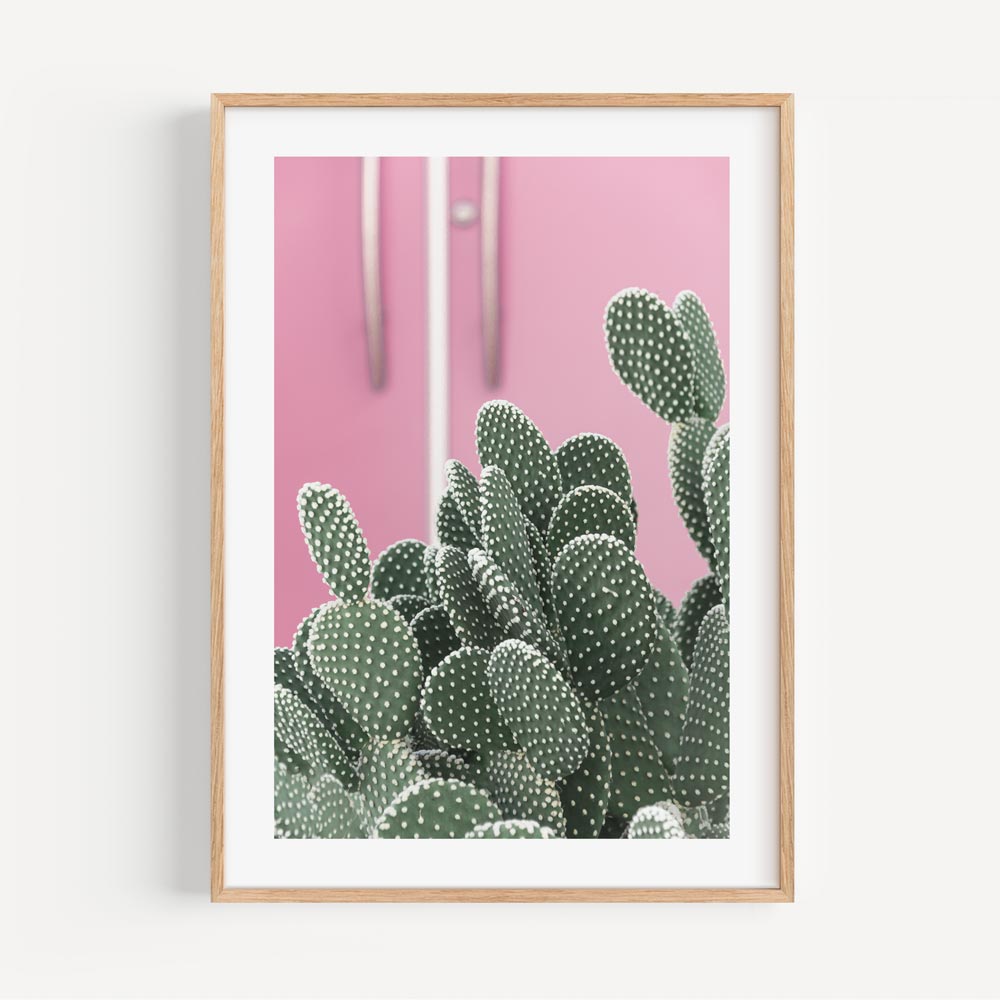  Elevate your space with this captivating wall artwork of a cactus plant in Palm Springs.