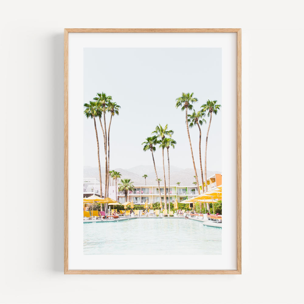 Fine art prints: A golden framed photo of palm trees and a pool at The Saguaro Hotel in Palm Springs - Oblongshop