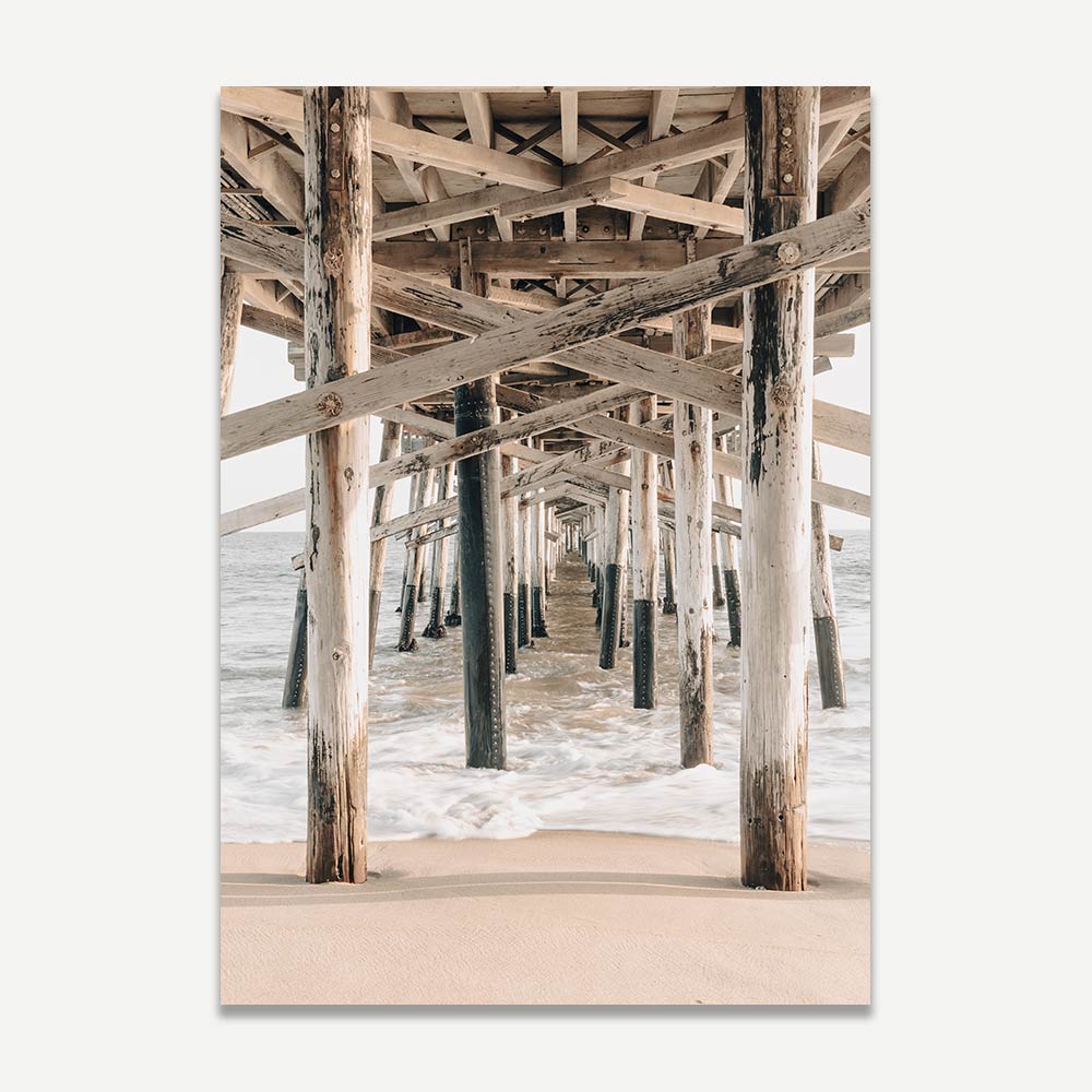 Wall art featuring a white framed photo of the ocean under a pier - Real photography from California coast, ideal for cool art decor.