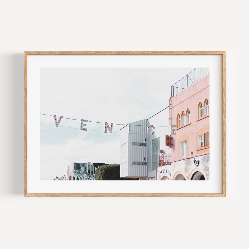 Framed Venice Sign at Boardwalk: Distinctive feature of the Venice Beach Boardwalk, representing the eclectic charm of the area, perfect for canvas prints.